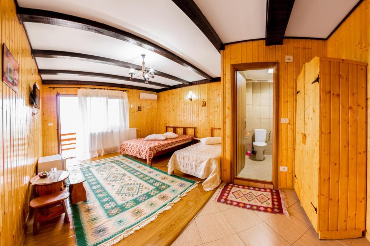 Pensiunea La Maria Lu' Sandoiu Hotel Poenari Ngoại thất bức ảnh
